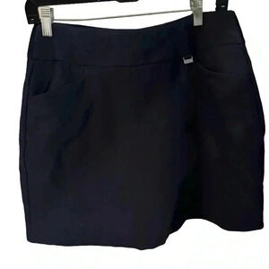 Greg Norman Play Dry women’s golf/tennis skort. Navy blue size medium